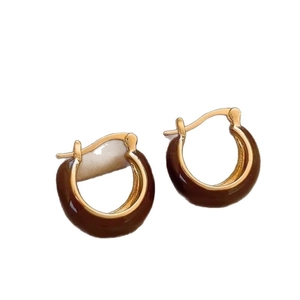 Minimalist French style C-shaped huggie earrings with gold plating and dark brown enamel