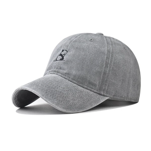 Detail of grey washed cotton baseball cap with panda embroidery and vintage distressed finish