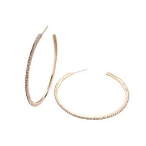 Elegant gold-plated hoop earrings with sparkling cubic zirconia on white background