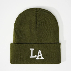 Olive green knit beanie with white embroidered LA logo in a ribbed texture