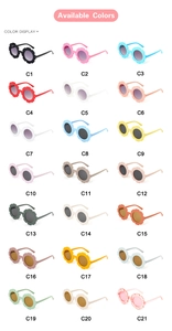 Grid display of 21 colorful flower-shaped sunglasses for kids in various bright tones