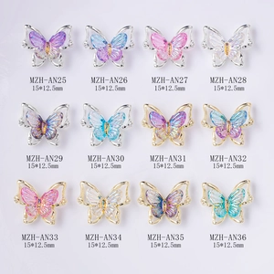 Pack of 12 luxury laser laser butterfly nail charms with aurora resin and metal frames