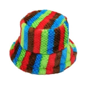 Macro view of colorful fuzzy faux fur texture on a striped winter bucket hat fabric