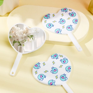 Three heart-shaped handheld mirrors with white frames and cute cartoon patterns