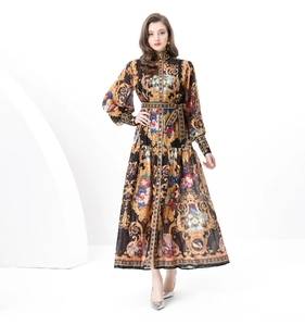 Detail of vintage Baroque print dress with stand collar and lantern sleeves on a model