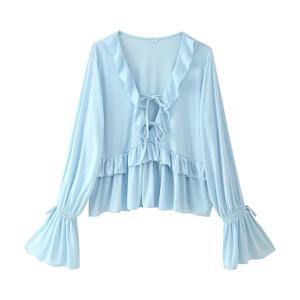 Light blue V-neck ruffled cardigan top with flared sleeves and front ties in loose fit