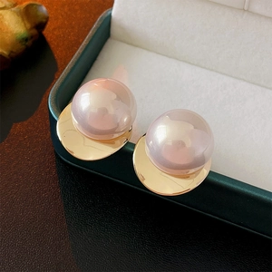 Elegant gold metal round earrings with iridescent pink faux pearls in a gift box