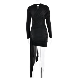 Detail view of the elegant black mini dress back with ruched fabric and asymmetric drape