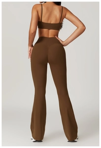 Detail view of v-shaped back seam on high-waist flared yoga pants for body contouring
