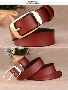 Macro detail of mahogany genuine leather belt with a polished gold square buckle