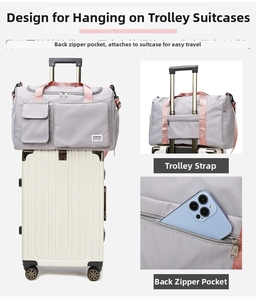 Detail of travel bag showing back trolley sleeve and zipper pocket for phone