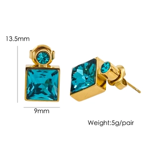 Detail view of gold titanium earrings with blue square crystal and dimensions 13.5mm by 9mm