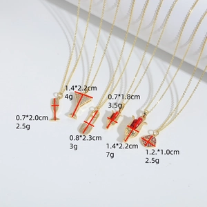 Golden goblet and lip pendants with cubic zirconia, size and weight data shown
