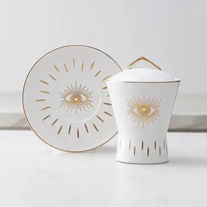 Ceramic Evil Eye sugar jar set with lid and saucer featuring golden accent lines