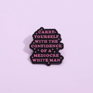 Inspirational enamel pin with pink text saying Carry yourself with confidence on purple back
