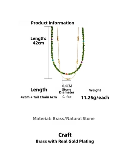 Detailed view of layered necklace with 4mm green stone beads and gold-plated brass chain