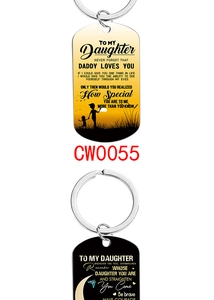 Detail of military-style keychains with sentimental quotes for daughter on white background