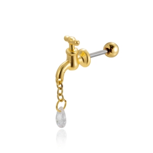 Macro shot of gold faucet stud earring with a teardrop crystal pendant on white background