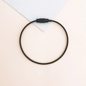 Close-up of black coated steel wire keychain with a secure screw lock mechanism