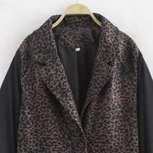 French style leopard print wool blend coat with black contrast sleeves and notched lapels
