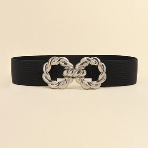 Detail of a black elastic belt featuring a prominent silver double-ring metal buckle