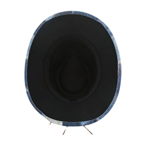 Detail view of the vintage blue denim cowboy hat interior with black sweatband lining