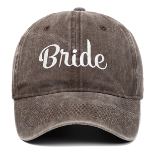 Detailed embroidery of white script Bride text on vintage washed cotton baseball cap