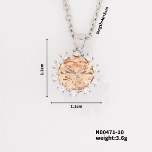 Macro shot of champagne zircon pendant showing 1.2x1.1cm dimensions and 40+5cm chain
