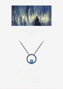 Detailed view of S925 silver evil eye pendant with blue zircons and enamel inlay