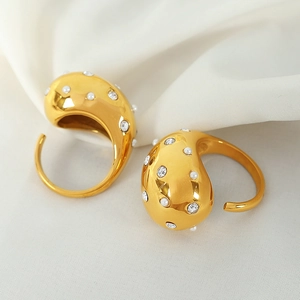 18K gold-plated C-shaped earrings with micro-inlaid pearls and rhinestones on soft fabric