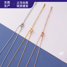 Close-up of gold, silver and rose gold stainless steel necklaces with adjustable lobster clasp