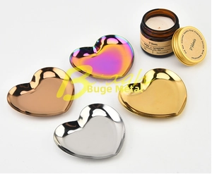 Detailed mirror-finish texture on heart-shaped stainless steel jewelry storage trays
