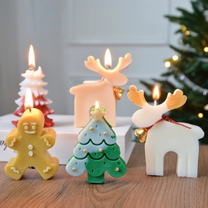 Christmas candle set with gingerbread man, trees and reindeer shapes for cozy decor