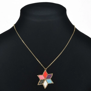 Bohemian colorful seed bead necklace with gold chain and a hexagonal star pendant
