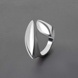Polished silver leaf-shaped wrap ring with elegant curved crossover design details