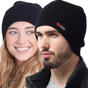 Detail of the black knit beanie with a stylish fashion label and warm ribbed texture
