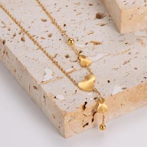 Minimalist stainless steel gourd pendant necklace with layered ginkgo leaf tassels in gold