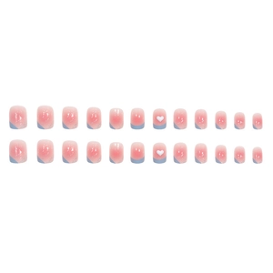 Pink gradient press-on nails with blue French tips and 3D white heart accents