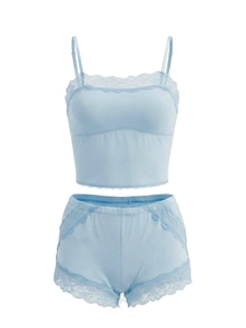 Detailed view of light blue lace trim on wireless camisole and shorts sleepwear set