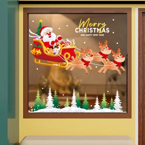 Christmas window stickers featuring Santa, reindeer sleigh and Merry Christmas text decor