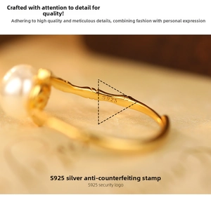 Macro shot of S925 sterling silver stamp on the bamboo-style pearl ring band
