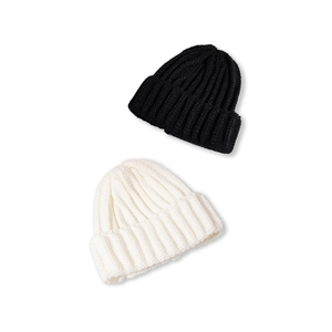 Classic ribbed knit beanie in black and white with wide folded cuffs for winter warmth