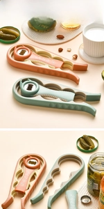 Detail showing the non-slip grip of the multifunctional 4-in-1 bottle opener set