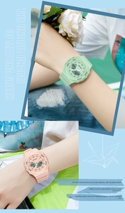 Detailed view of pink and green dual-display digital watches with resin straps