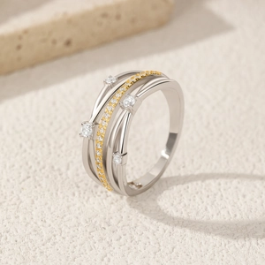 Minimalist S925 sterling silver intertwined ring with gold and silver bands and diamonds