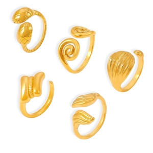 Set of five 18k gold plated stainless steel open rings with various textured designs