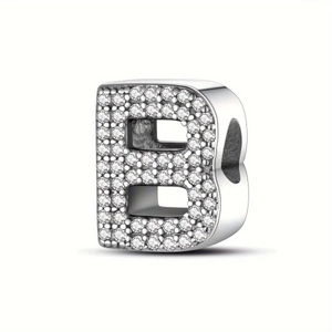 Close-up of silver letter B charm bead with sparkling pavé cubic zirconia inlay