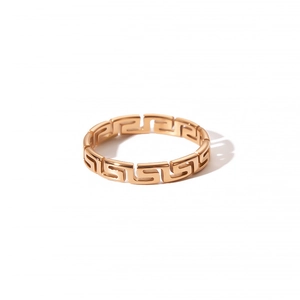 Macro detail of rose gold stainless steel ring featuring Greek Meander pattern design