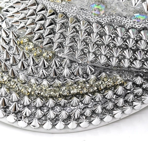 Silver captain hat with metallic spikes, rhinestones, and sequins for party events