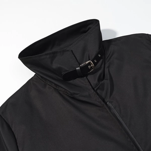 Close-up of black stand collar with faux leather strap buckle and metallic fastener details